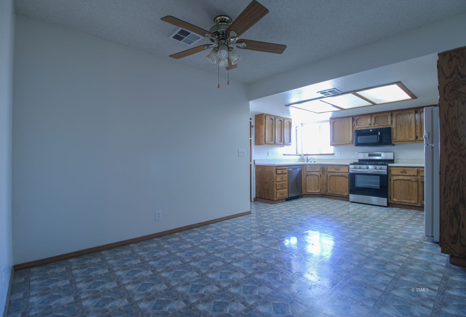 609 South Appaloosa Street Ridgecrest, CA 93555 - Photo 11 of 44 a view of a kitchen with a sink cabinets and window