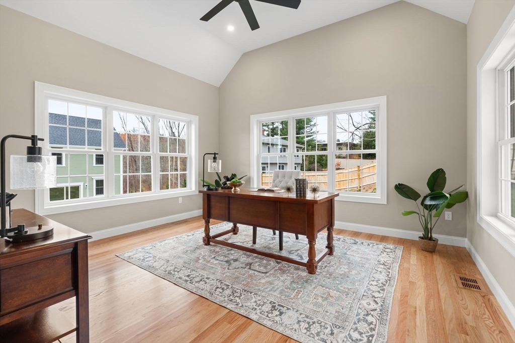 103 Central Street Andover, MA 01810 - Photo 21 of 42 a living room with furniture and a potted plant