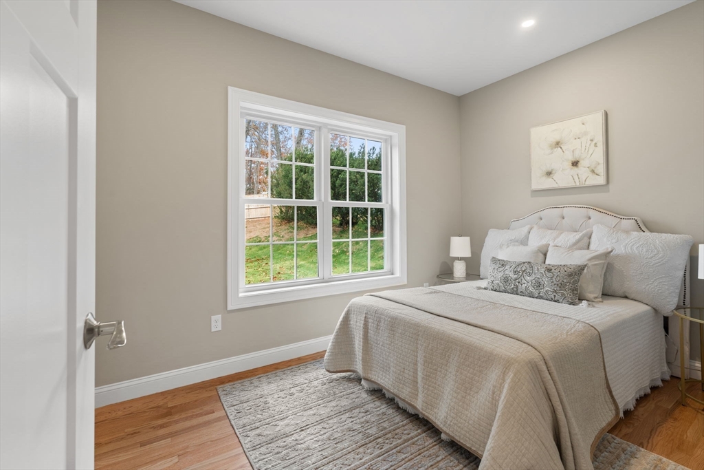 103 Central Street Andover, MA 01810 - Photo 24 of 42 a bedroom with a bed and a window