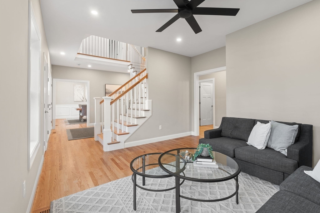 103 Central Street Andover, MA 01810 - Photo 5 of 42 a living room with furniture and a wooden floor