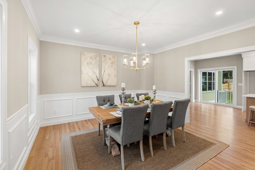 103 Central Street Andover, MA 01810 - Photo 10 of 42 a view of a dining room with furniture window and wooden floor