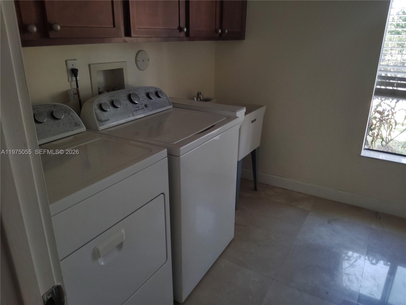 7944 Southwest 194th Street Cutler Bay, FL 33157 - Photo 5 of 10 a utility room with dryer and washer