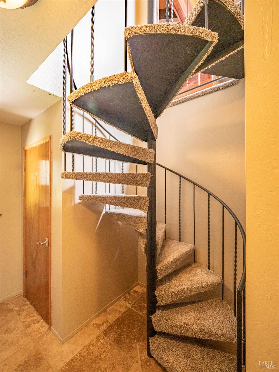 7701 Signal Ridge Road Philo, CA 95466 - Photo 16 of 32 Sprial staircase leading to the lower level