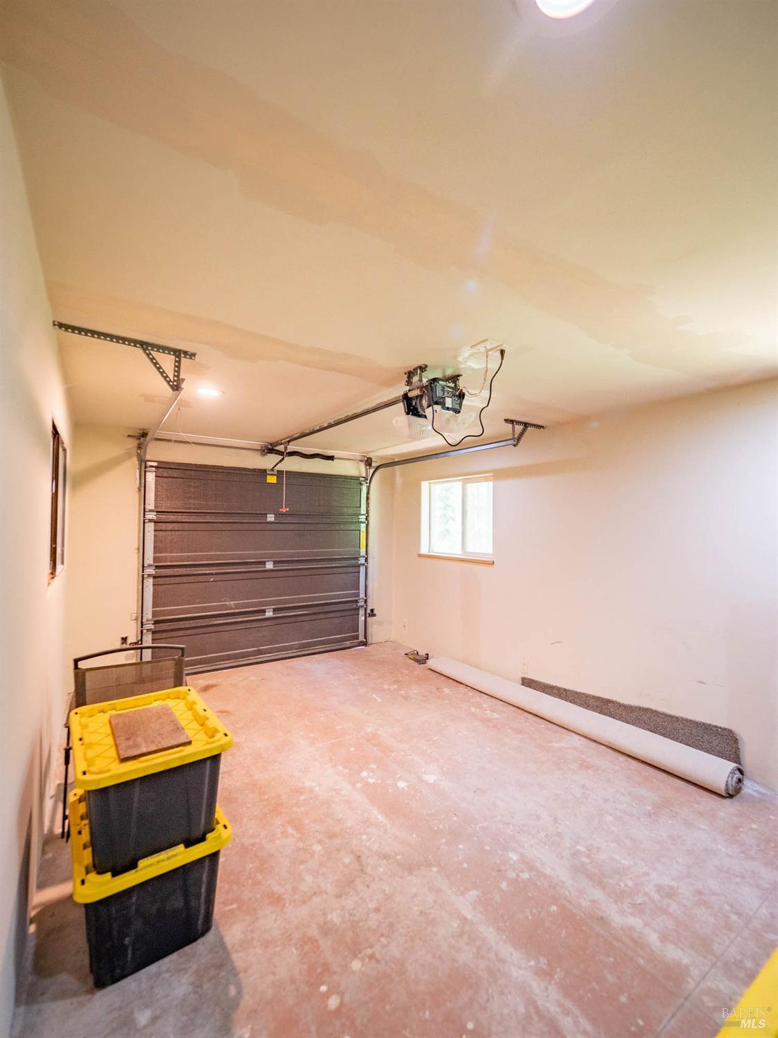 7701 Signal Ridge Road Philo, CA 95466 - Photo 23 of 32 Inside the single car garage; both garages have automatic door openers