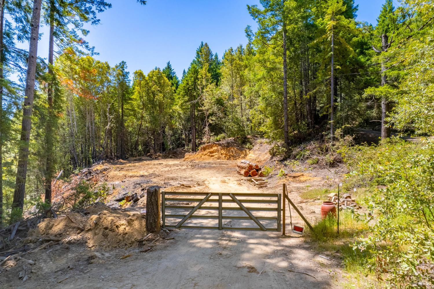 7701 Signal Ridge Road Philo, CA 95466 - Photo 31 of 32 This open flat area is separate from the yard area around the home. It awaits new plans and ideas.