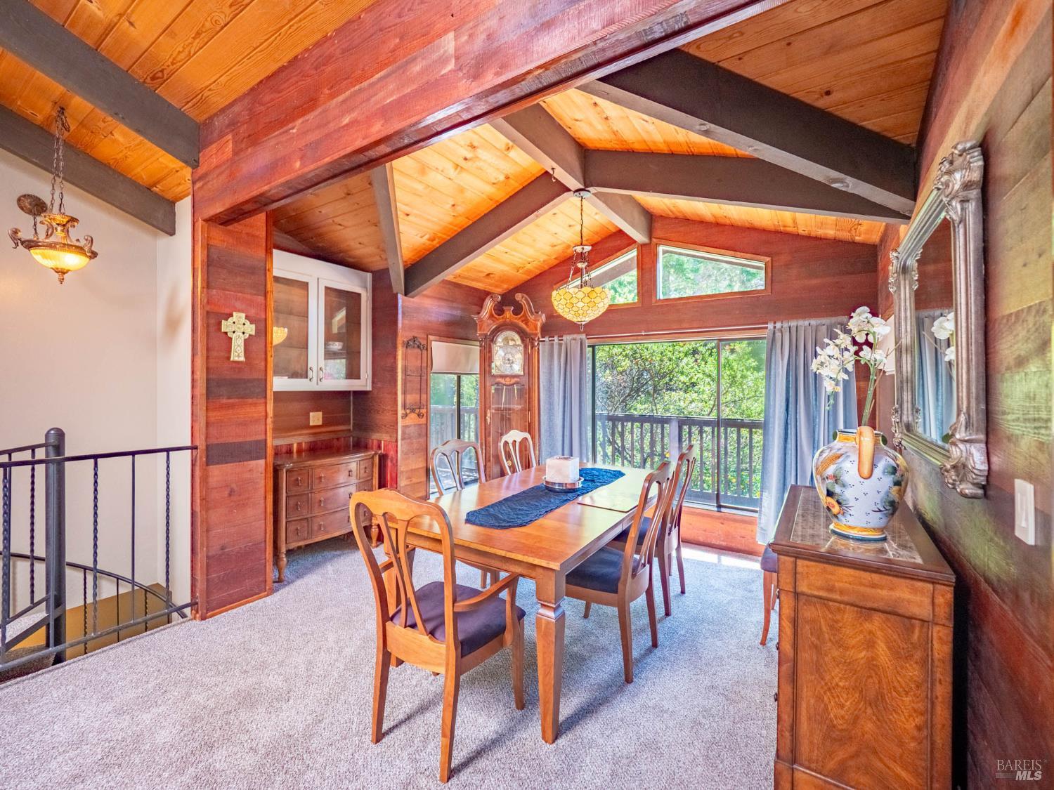 7701 Signal Ridge Road Philo, CA 95466 - Photo 7 of 32 The dining room offers a lovely separate dining space yet extends into the open flow of the street level living space.