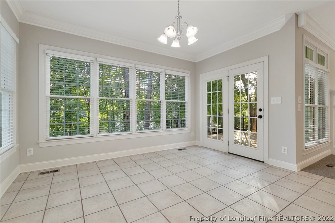 480 Whispering Pines Drive Spring Lake, NC 28390 - Photo 15 of 48 a view of an empty room with a window