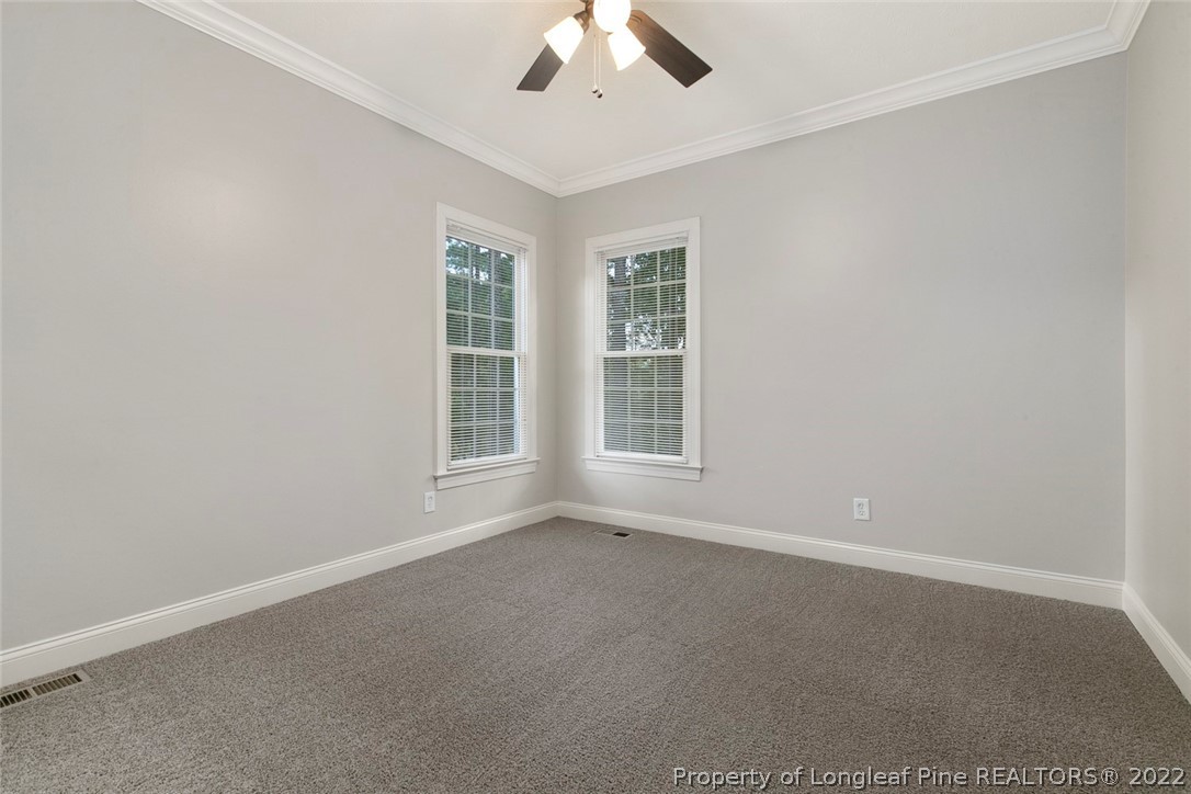 480 Whispering Pines Drive Spring Lake, NC 28390 - Photo 23 of 48 an empty room with a window