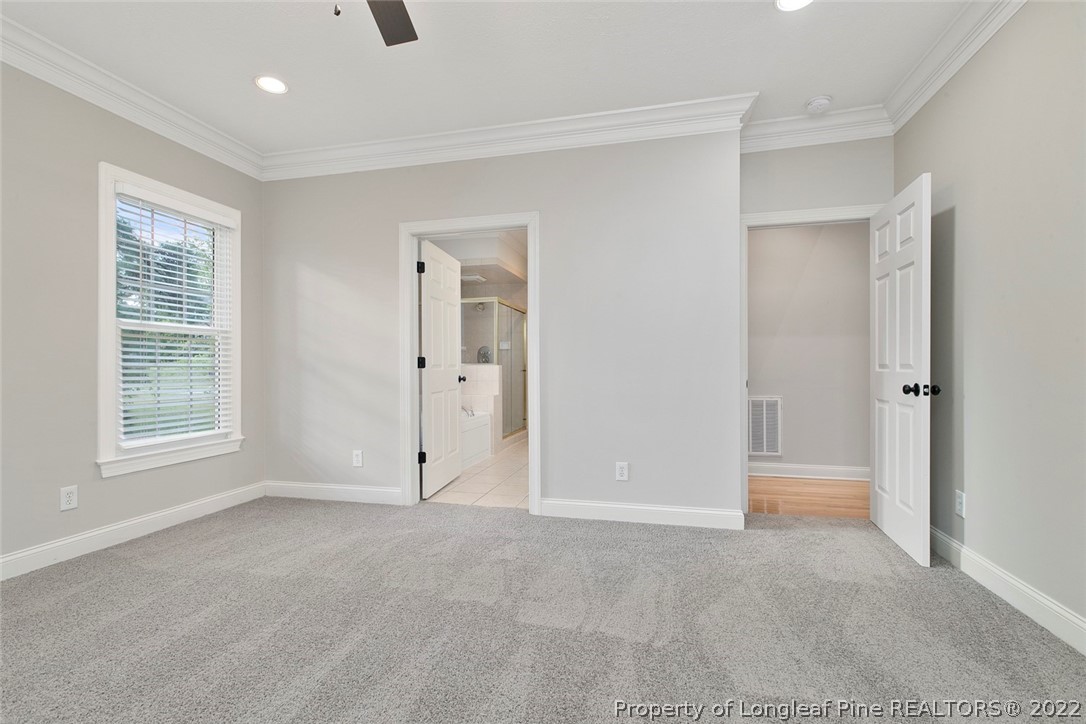 480 Whispering Pines Drive Spring Lake, NC 28390 - Photo 26 of 48 a view of an empty room with a window