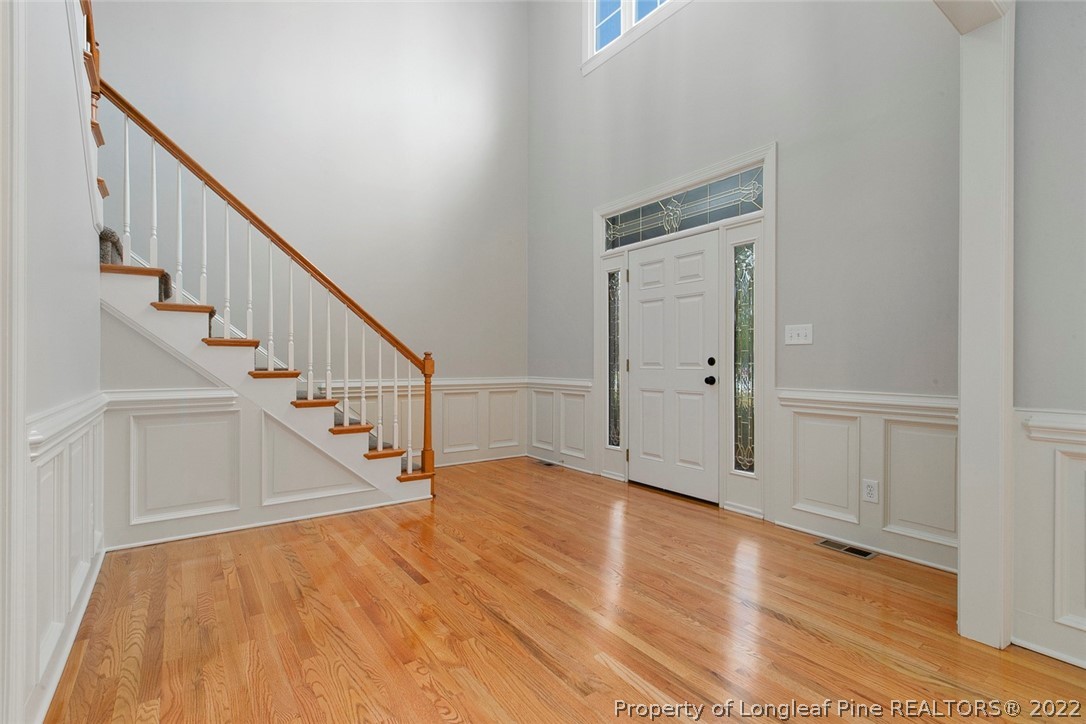 480 Whispering Pines Drive Spring Lake, NC 28390 - Photo 3 of 48 a view of entryway with wooden floor