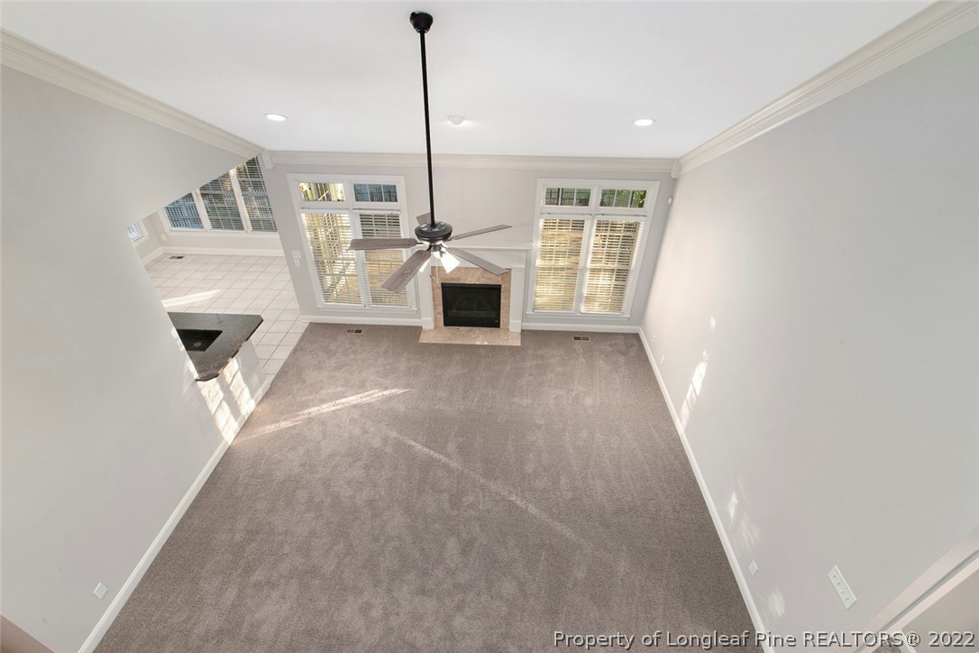 480 Whispering Pines Drive Spring Lake, NC 28390 - Photo 34 of 48 a view of a livingroom with a fireplace