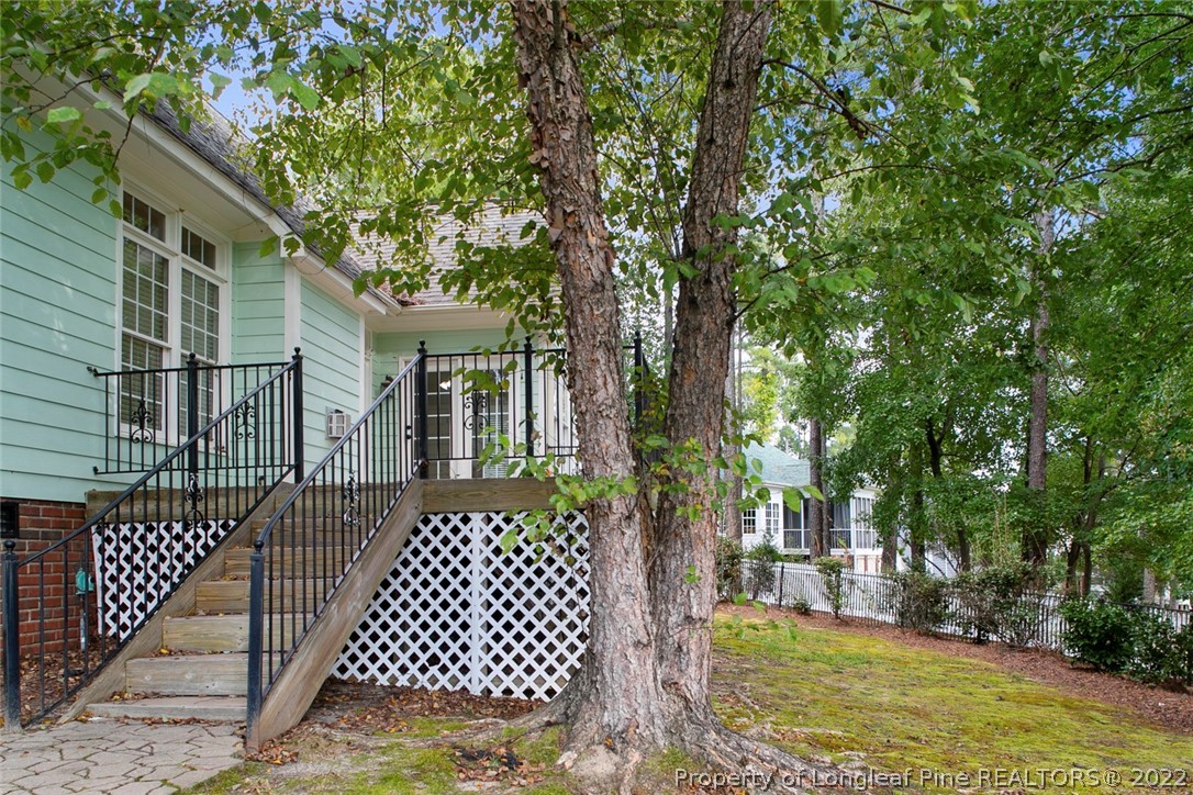 480 Whispering Pines Drive Spring Lake, NC 28390 - Photo 46 of 48 a front view of a house with a yard
