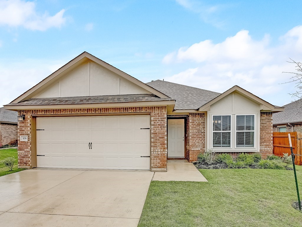 108 Bright Star Lane Georgetown, TX 78628 - Photo 1 of 1 front view of a house with a yard