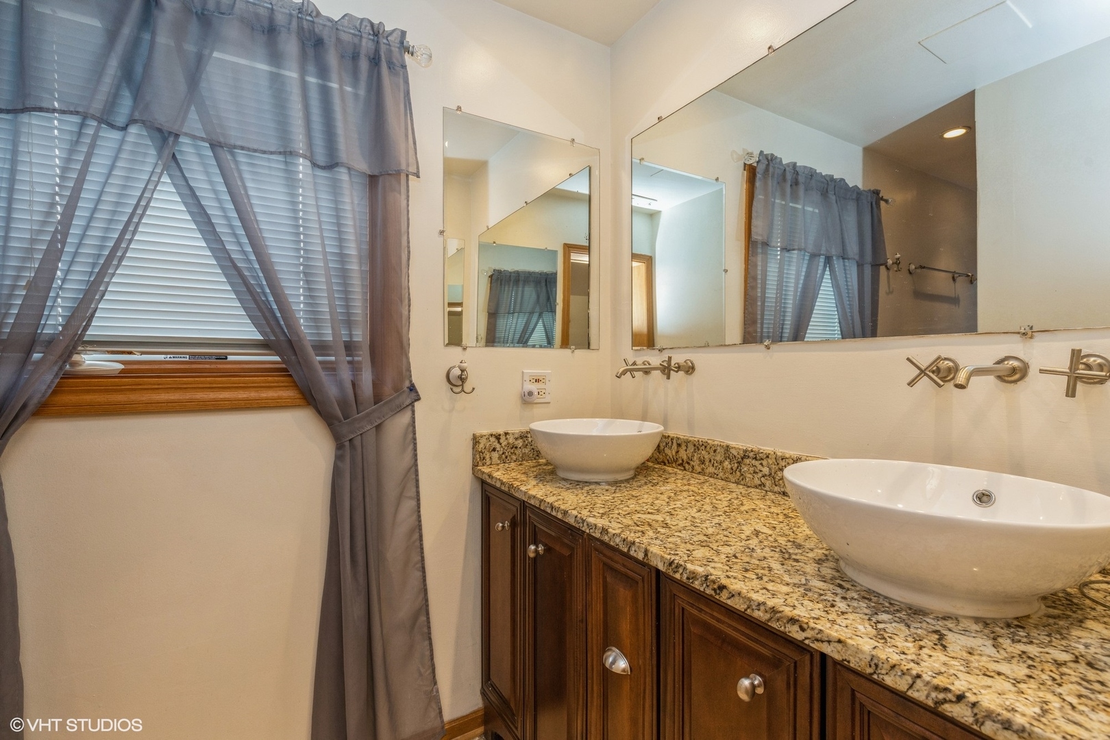 329 Killdeer Road Bloomingdale, IL 60108 - Photo 18 of 31 a bathroom with a granite countertop sink and a mirror