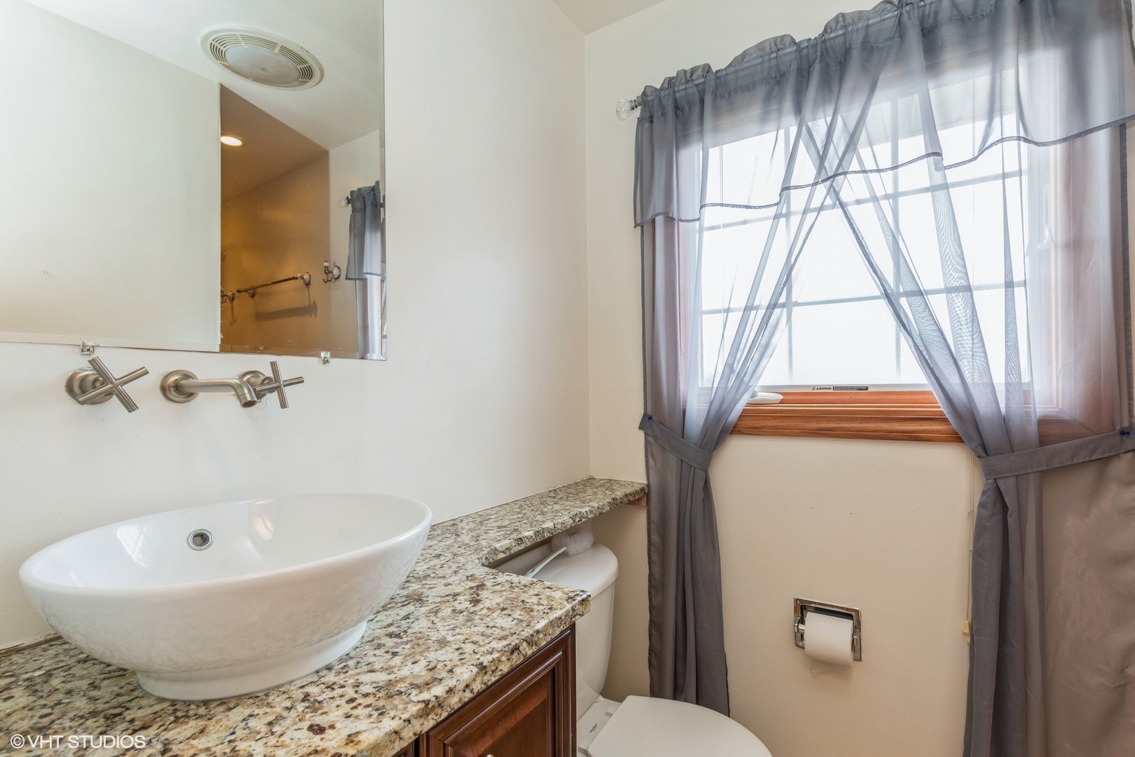 329 Killdeer Road Bloomingdale, IL 60108 - Photo 19 of 31 a bathroom with a granite countertop sink and a mirror