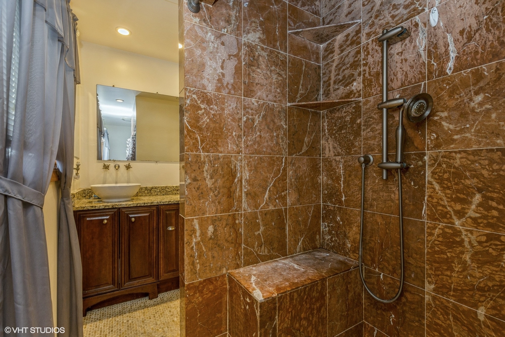 329 Killdeer Road Bloomingdale, IL 60108 - Photo 20 of 31 a bathroom with a sink shower and a mirror