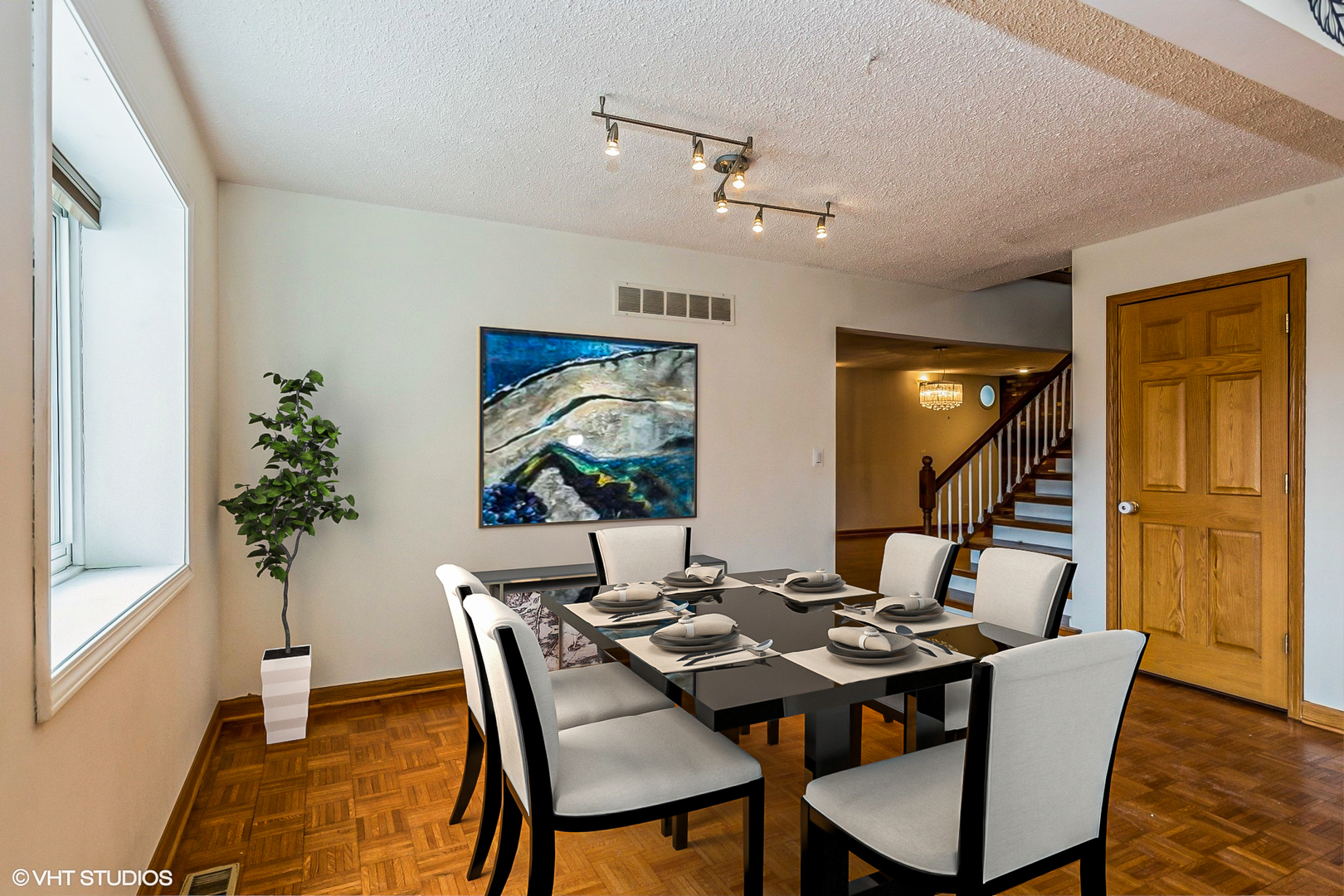 329 Killdeer Road Bloomingdale, IL 60108 - Photo 4 of 31 a view of a dining room with furniture window and wooden floor