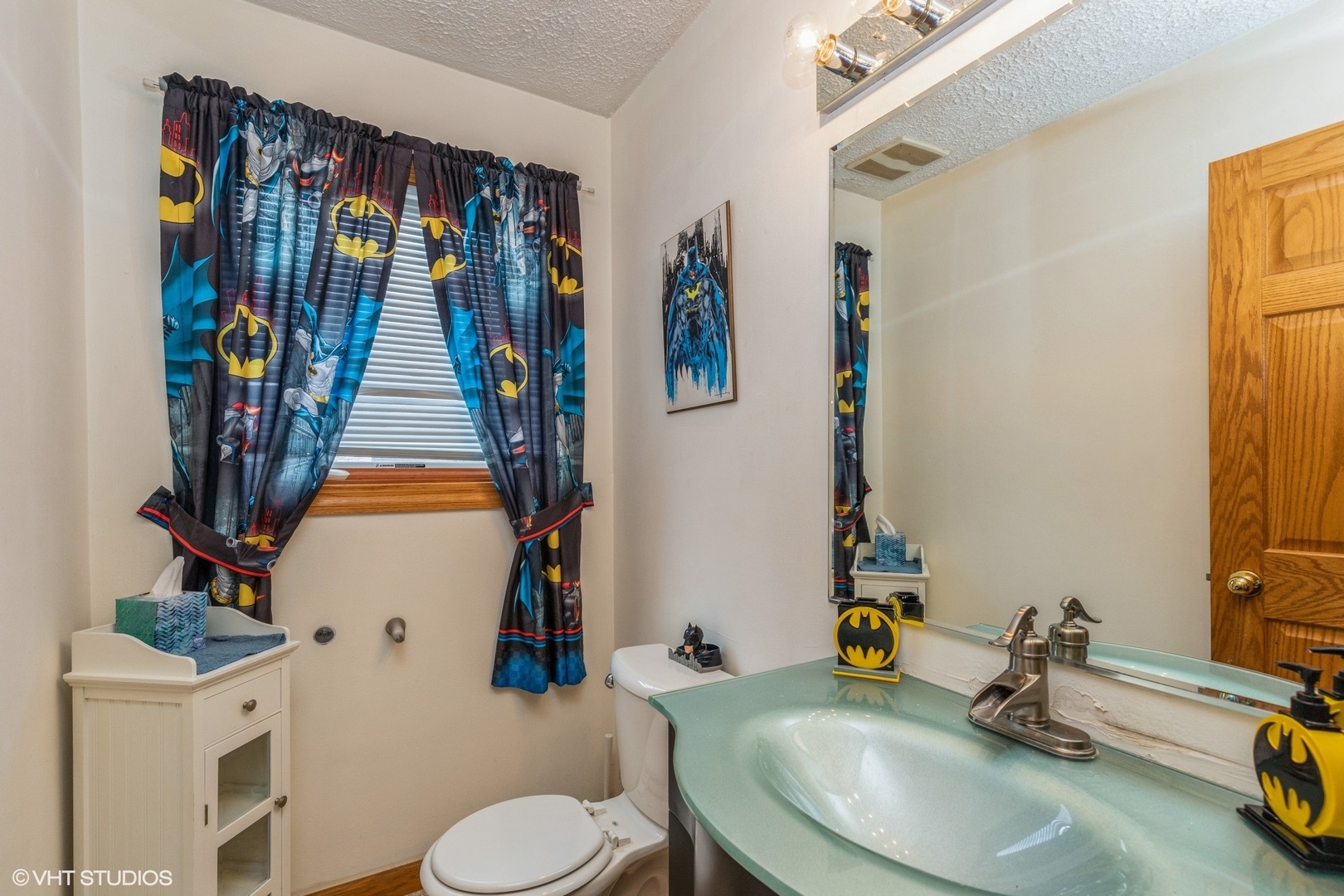 329 Killdeer Road Bloomingdale, IL 60108 - Photo 9 of 31 a bathroom with a sink toilet and mirror