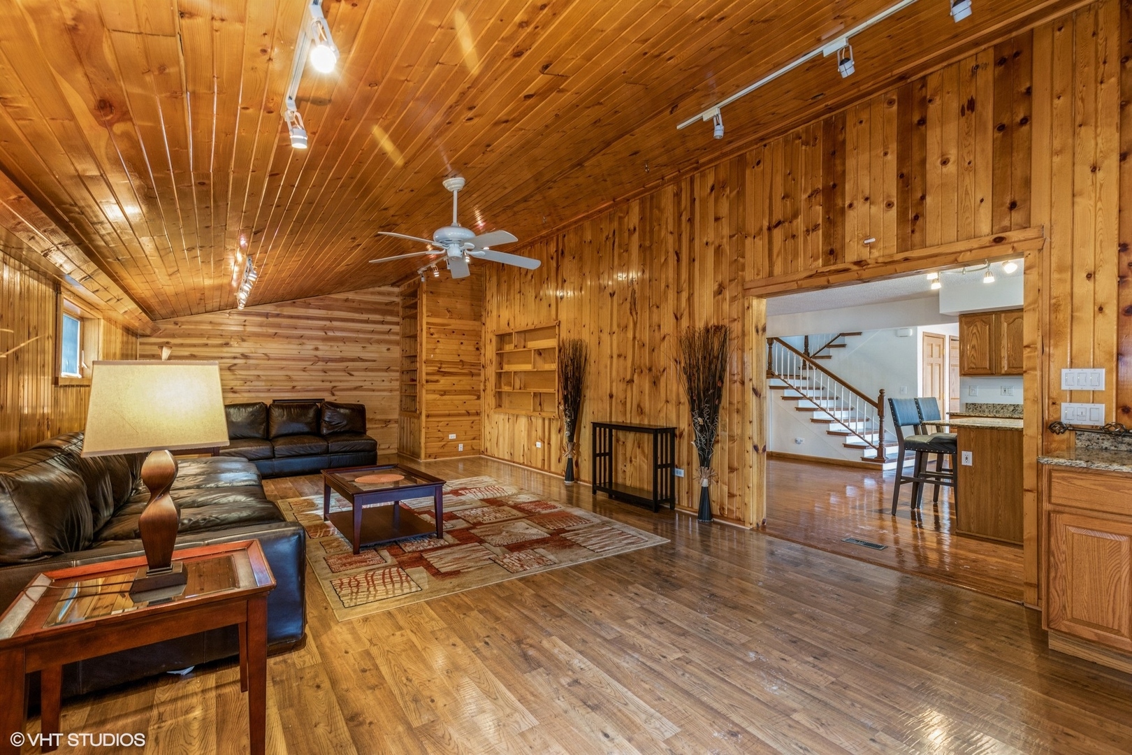 329 Killdeer Road Bloomingdale, IL 60108 - Photo 10 of 31 a living room with fireplace furniture and a wooden floor