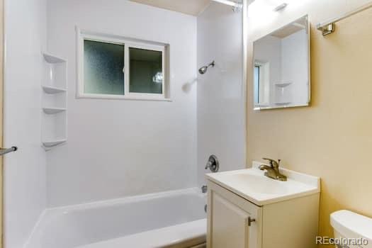 355 32nd Street Boulder, CO 80305 - Photo 7 of 14 a bathroom with a sink a toilet and shower