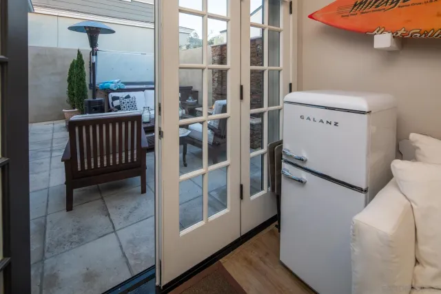a view of a hallway with washer and dryer