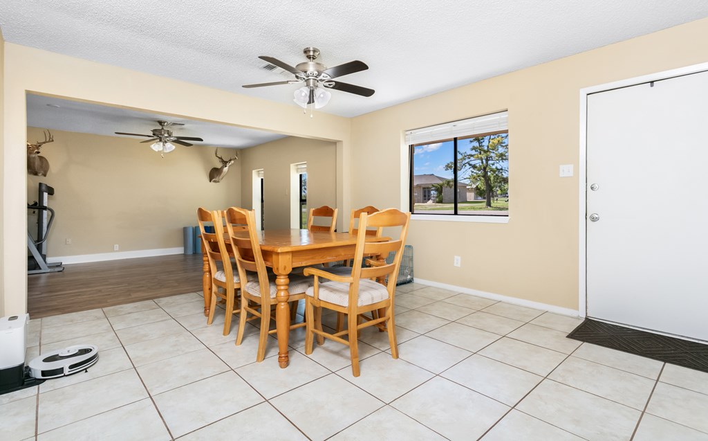 90 Quail Run Harper, TX 78631 - Photo 22 of 25 a dining room with furniture and window