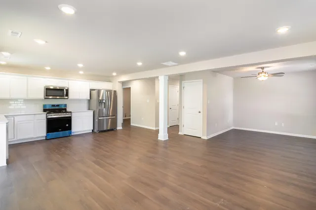a view of kitchen with wooden floor