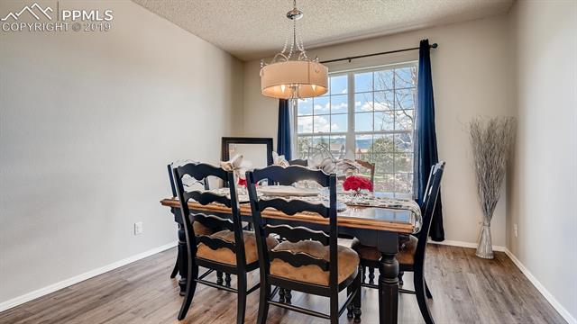 237 Talus Road Monument, CO 80132 - Photo 4 of 29 Lovely dining room with mountain views