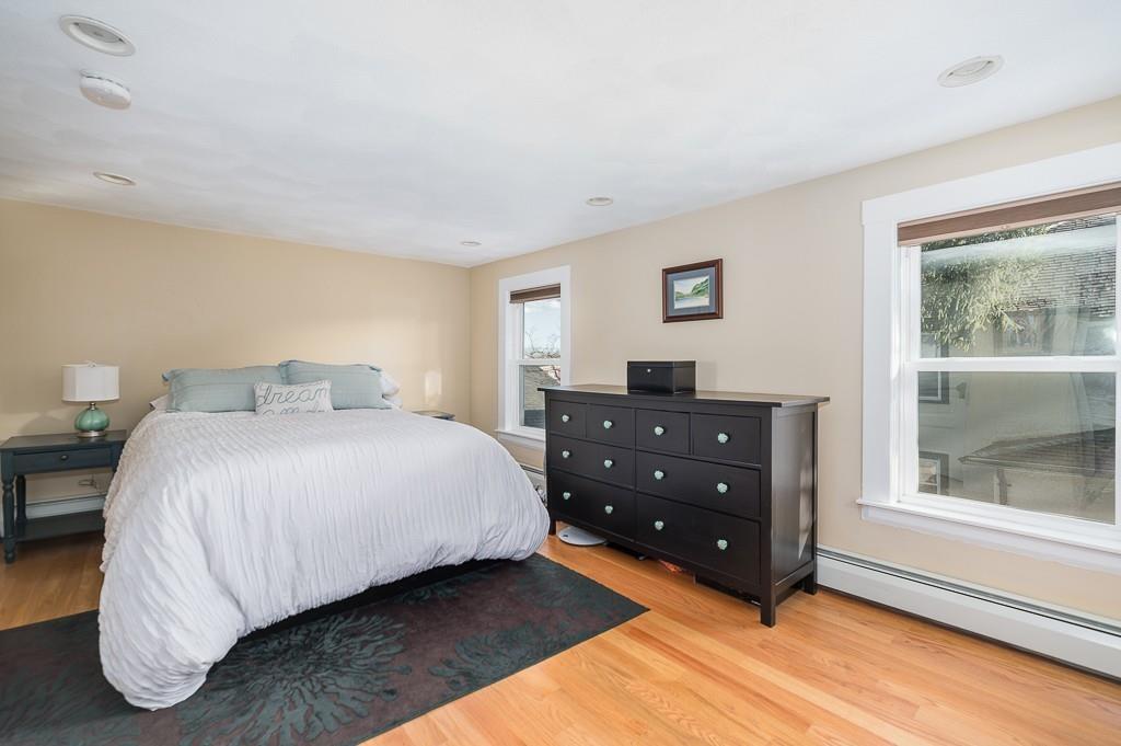 16 Bartlett Street Beverly, MA 01915 - Photo 12 of 28 a bedroom with a bed and window