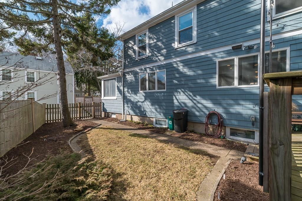 16 Bartlett Street Beverly, MA 01915 - Photo 23 of 28 a view of a house with a yard