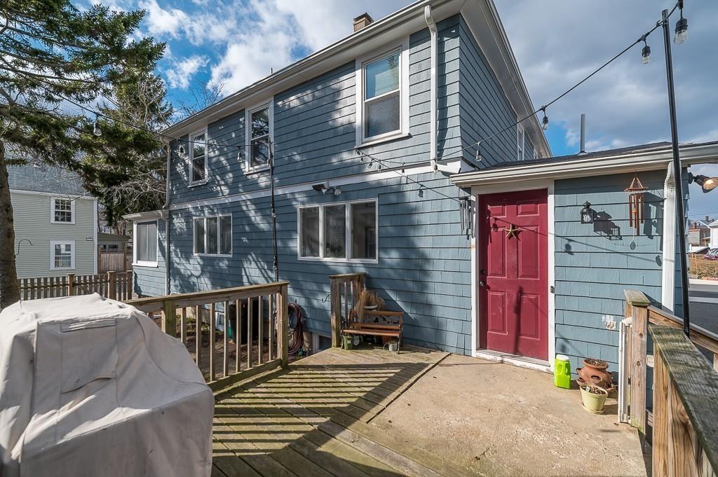 16 Bartlett Street Beverly, MA 01915 - Photo 27 of 28 a view of a house with backyard and deck