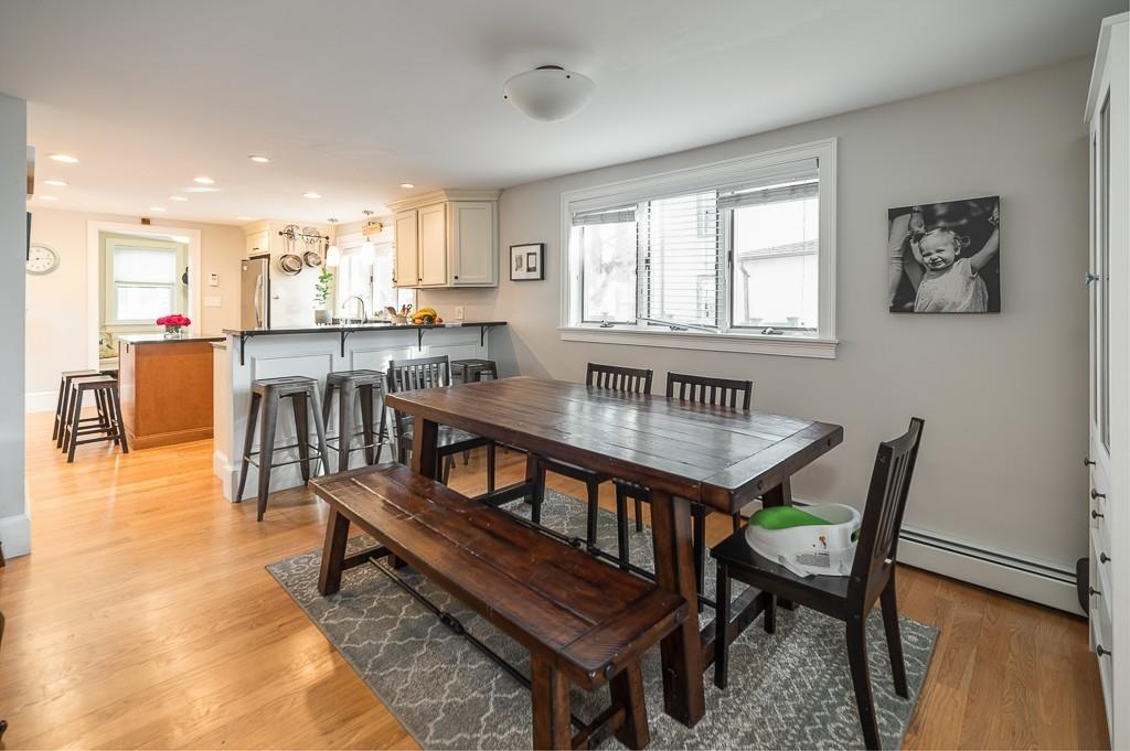 16 Bartlett Street Beverly, MA 01915 - Photo 5 of 28 a dining room with furniture and wooden floor