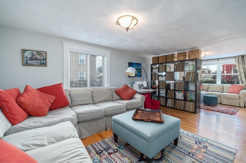 16 Bartlett Street Beverly, MA 01915 - Photo 6 of 28 a living room with furniture chess board and wooden floor