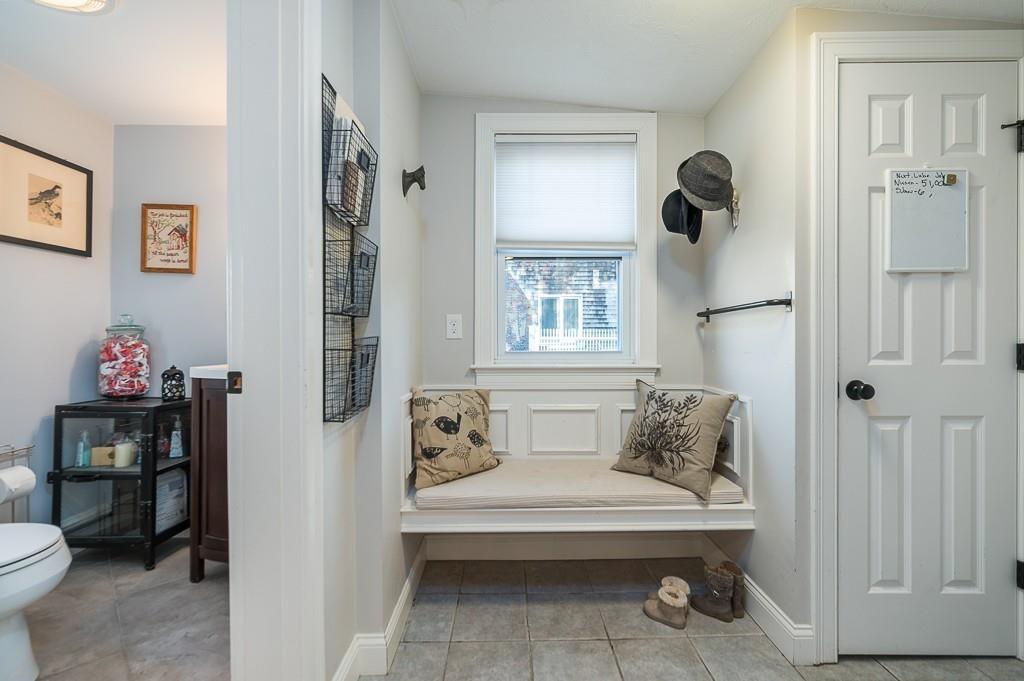 16 Bartlett Street Beverly, MA 01915 - Photo 10 of 28 a living room with furniture and a window