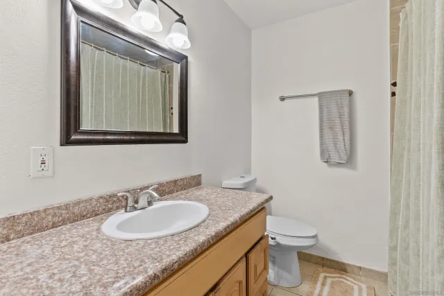 a workspace with furniture and wooden floor