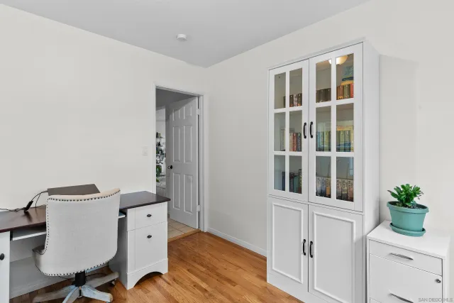 a room with chair and a window