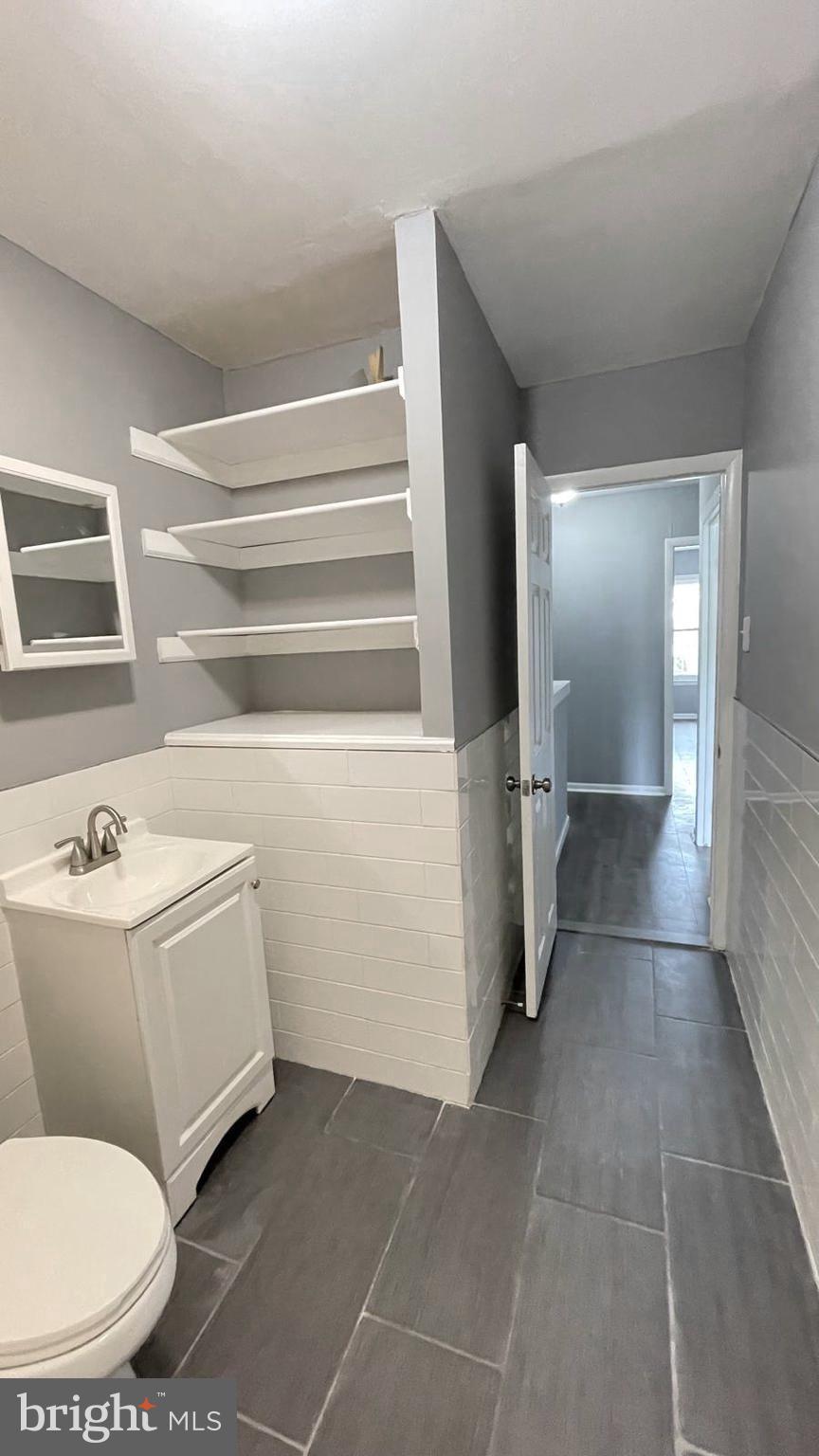 1340 West 7th Street Chester, PA 19013 - Photo 17 of 26 a bathroom with a sink a toilet and bathtub