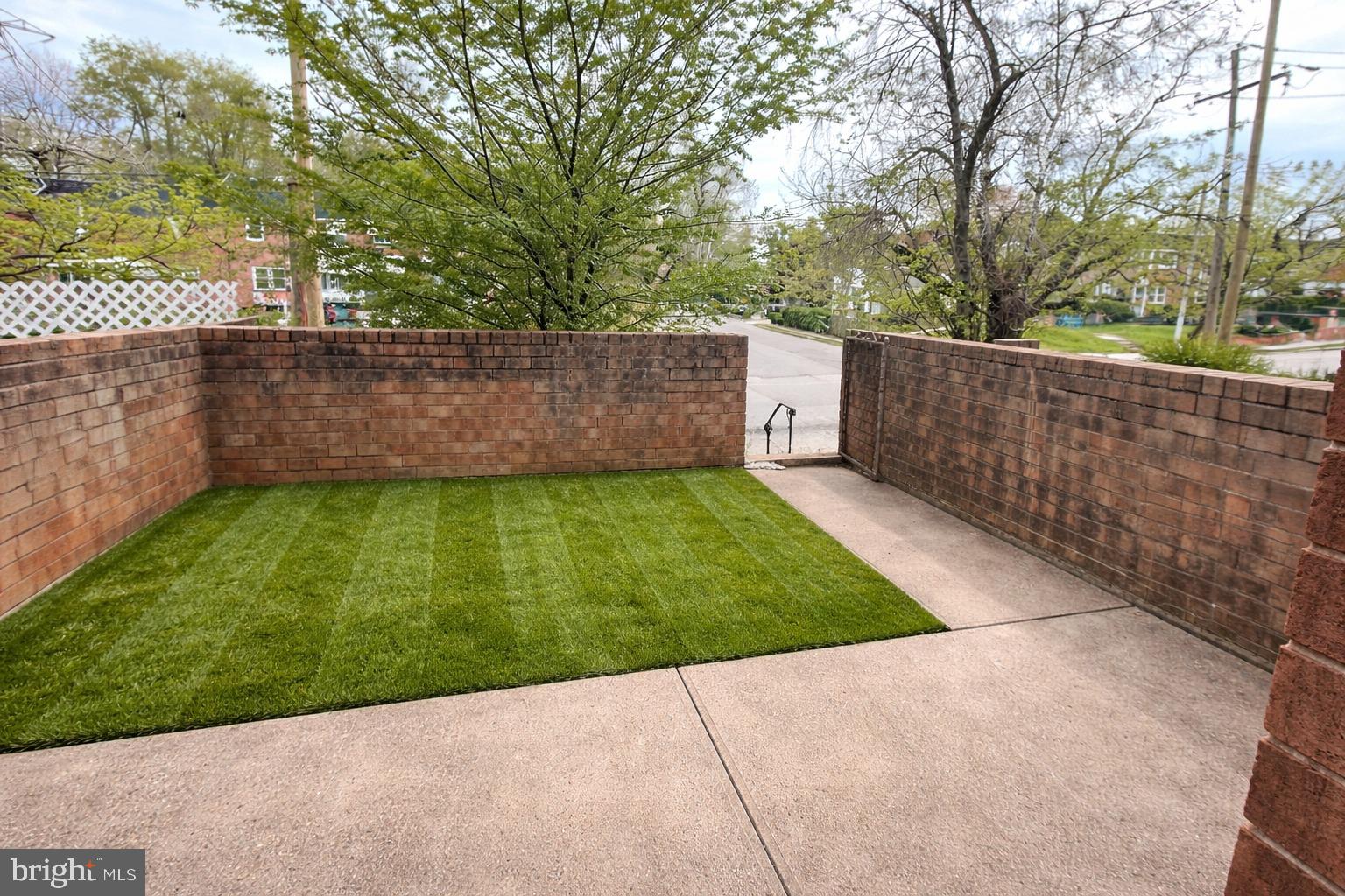 1340 West 7th Street Chester, PA 19013 - Photo 2 of 26 a view of a backyard with a trees