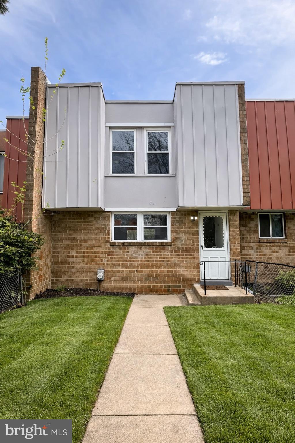1340 West 7th Street Chester, PA 19013 - Photo 25 of 26 a front view of a house with a yard