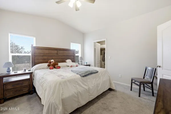 a view of a kitchen counter space dining table and chairs