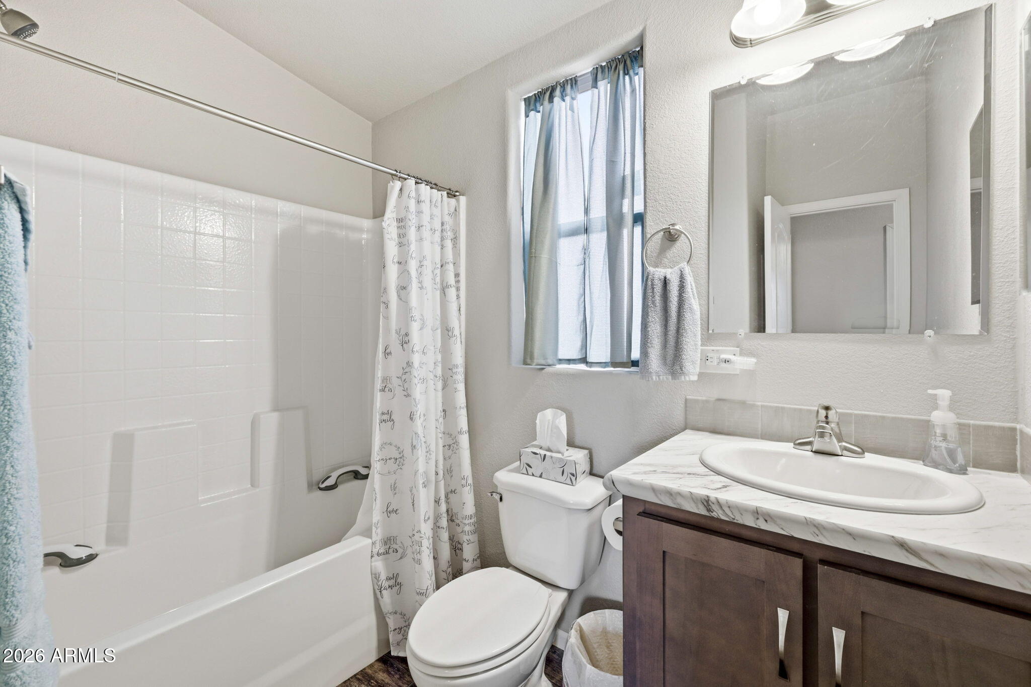 2145 Pulp Mill Road Clay Springs, AZ 85923 - Photo 19 of 33 a bathroom with a sink toilet and shower