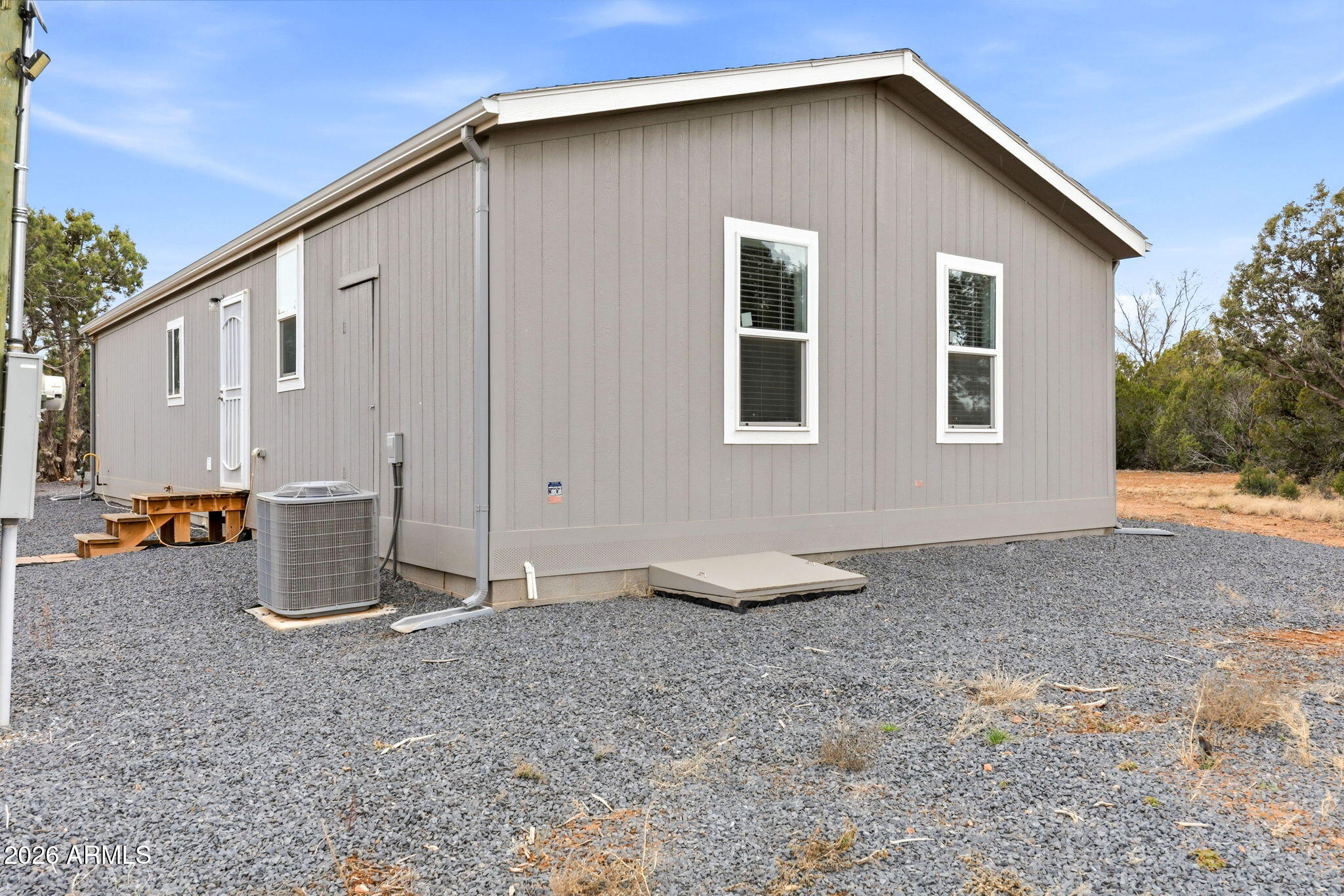 2145 Pulp Mill Road Clay Springs, AZ 85923 - Photo 21 of 33 a view of a house with backyard