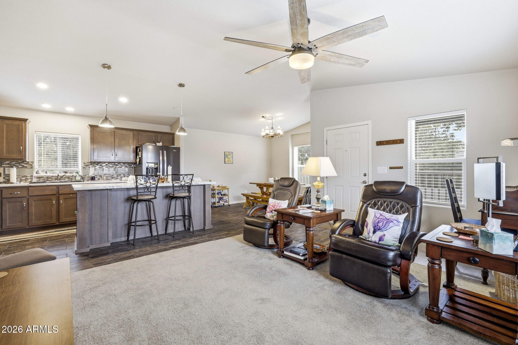 2145 Pulp Mill Road Clay Springs, AZ 85923 - Photo 9 of 33 a living room with furniture kitchen view and a chandelier