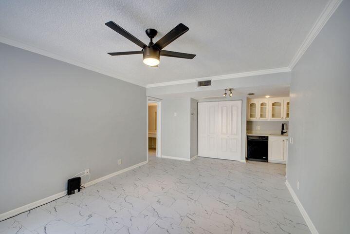 612 Executive Center Drive, Unit 103 West Palm Beach, FL 33401 - Photo 2 of 28 Living Room