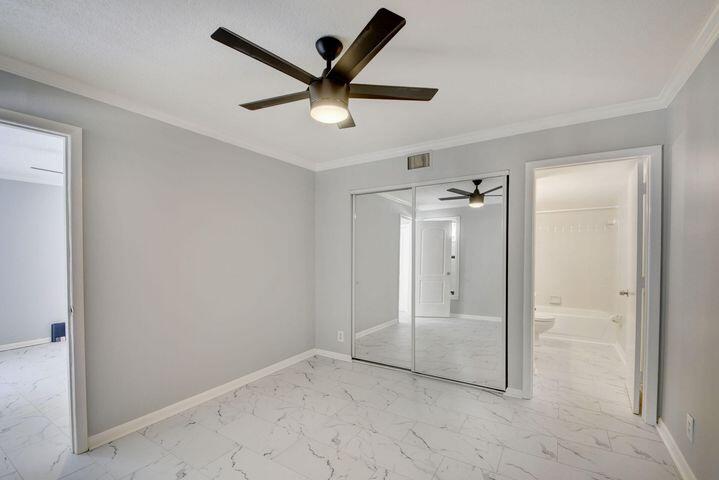 612 Executive Center Drive, Unit 103 West Palm Beach, FL 33401 - Photo 8 of 28 Bedroom