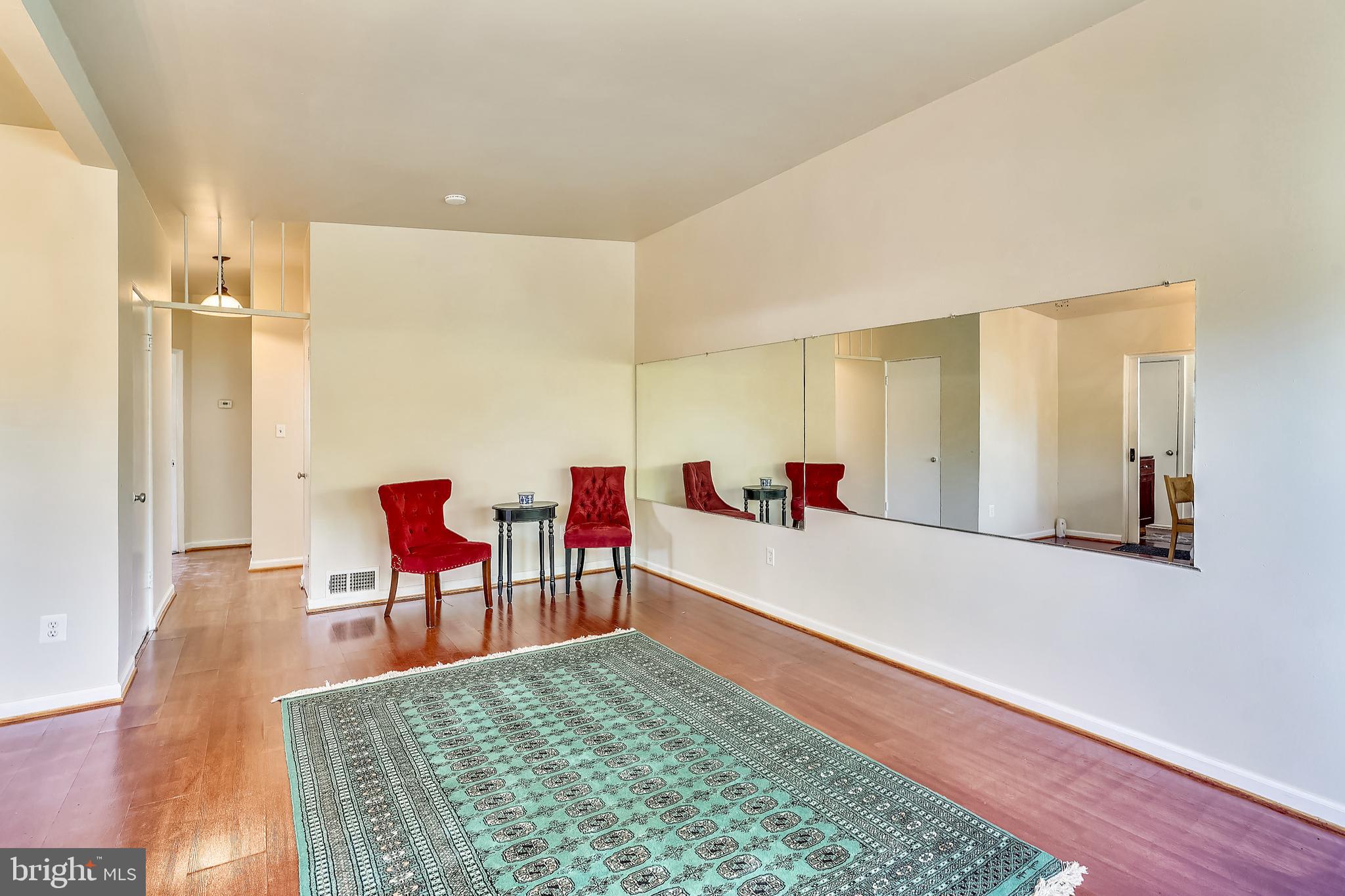 1067 Ruatan Street Silver Spring, MD 20903 - Photo 14 of 93 Living Area-Mirrored Walls Convey