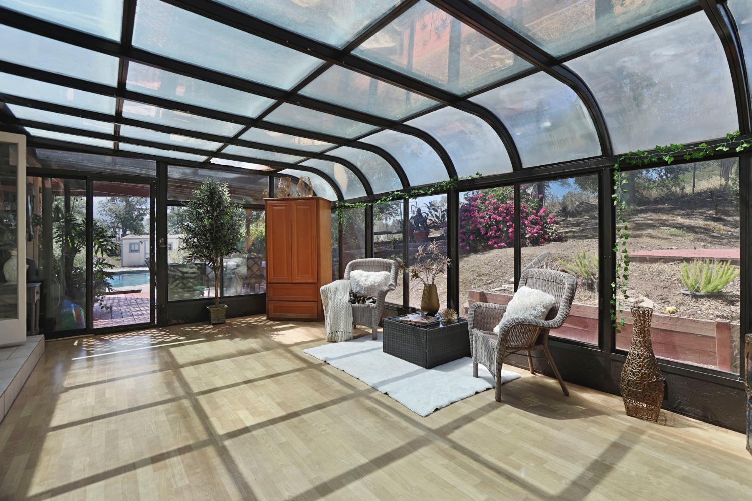 901 Quail Oaks Road Valley Springs, CA 95252 - Photo 31 of 59 a living room with large windows