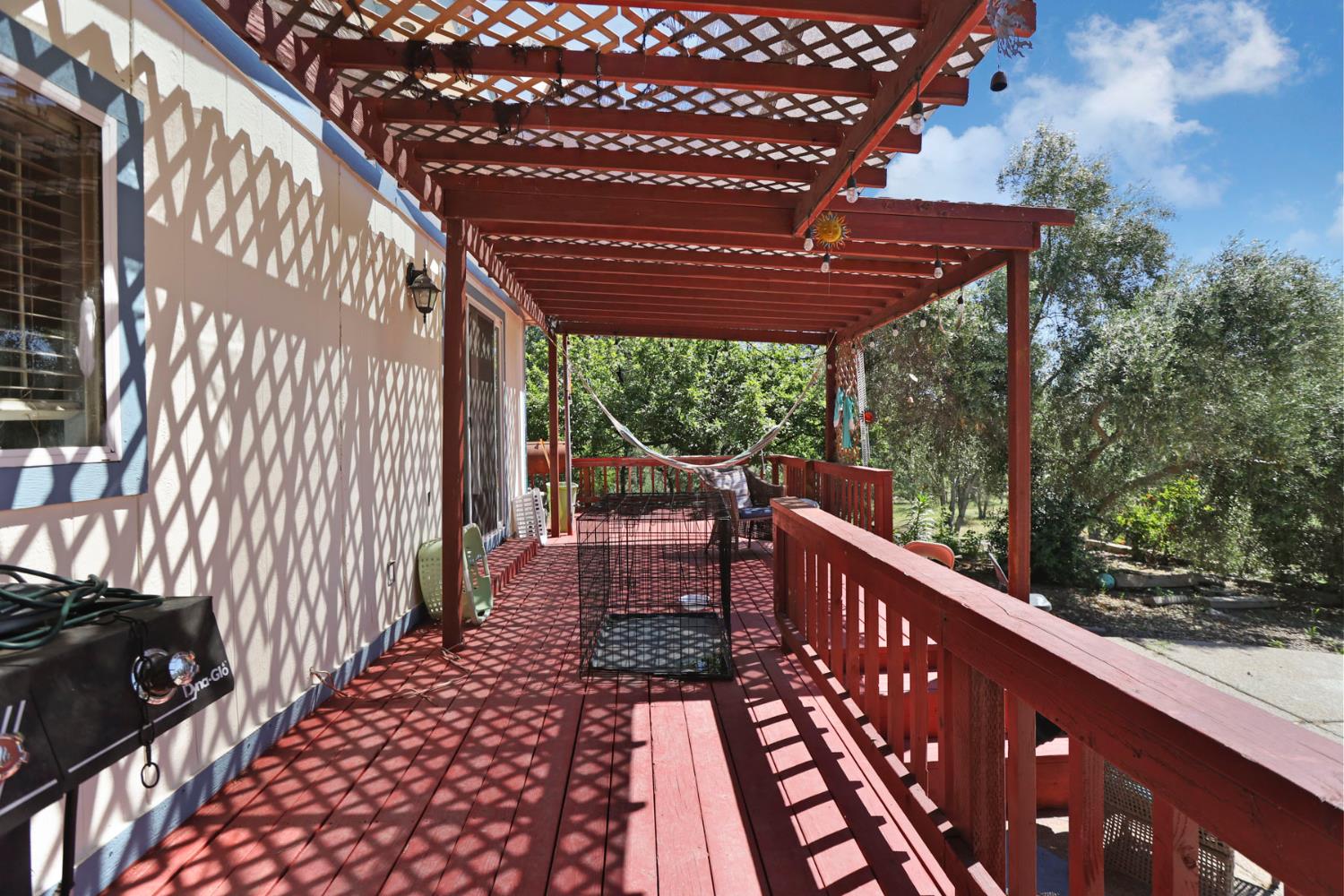 901 Quail Oaks Road Valley Springs, CA 95252 - Photo 39 of 59 a view of balcony with wooden floor