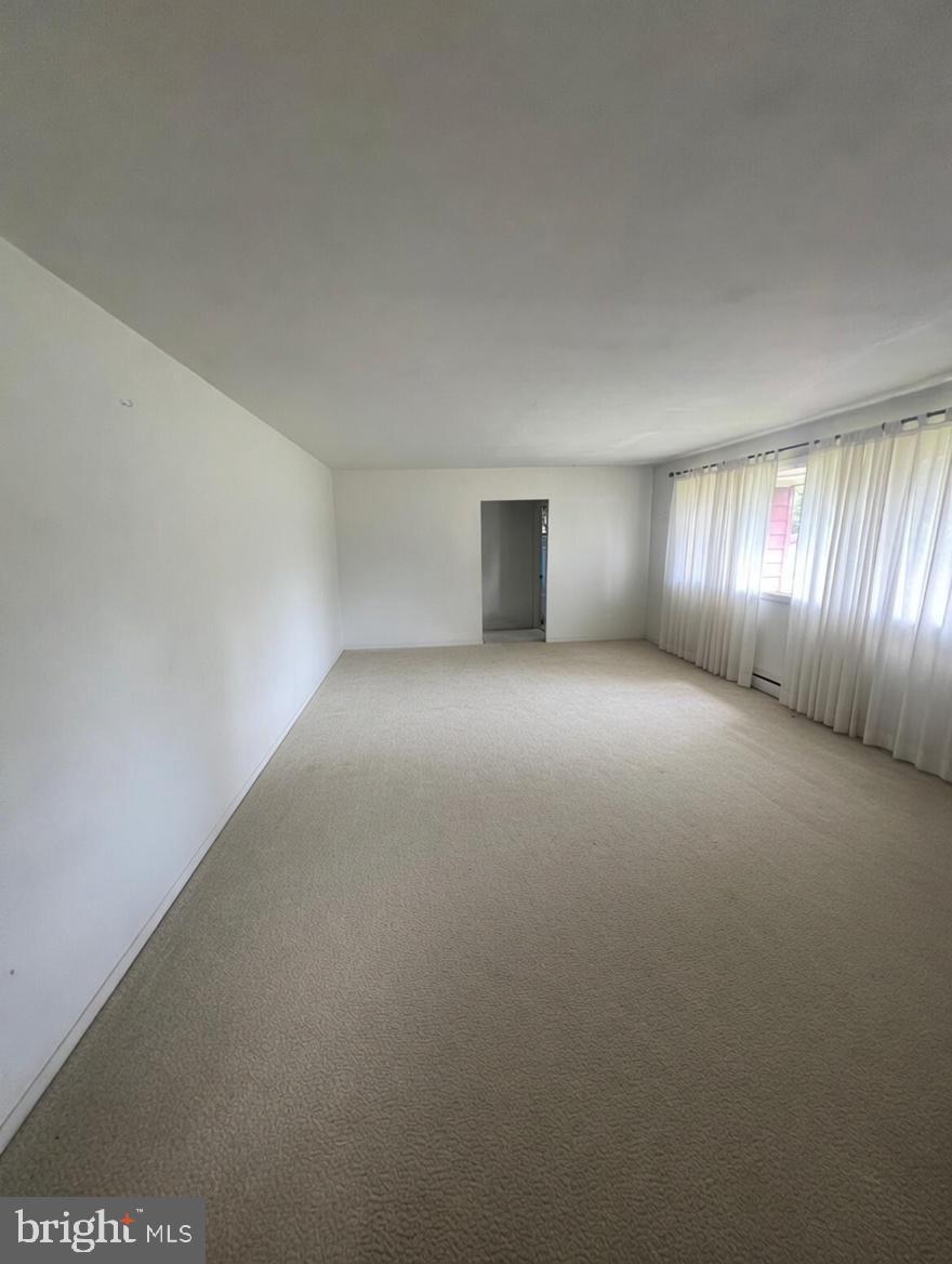 39 Lejune Road Cinnaminson, NJ 08077 - Photo 11 of 11 a view of an empty room with windows