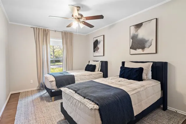 a bedroom with a bed and a couch